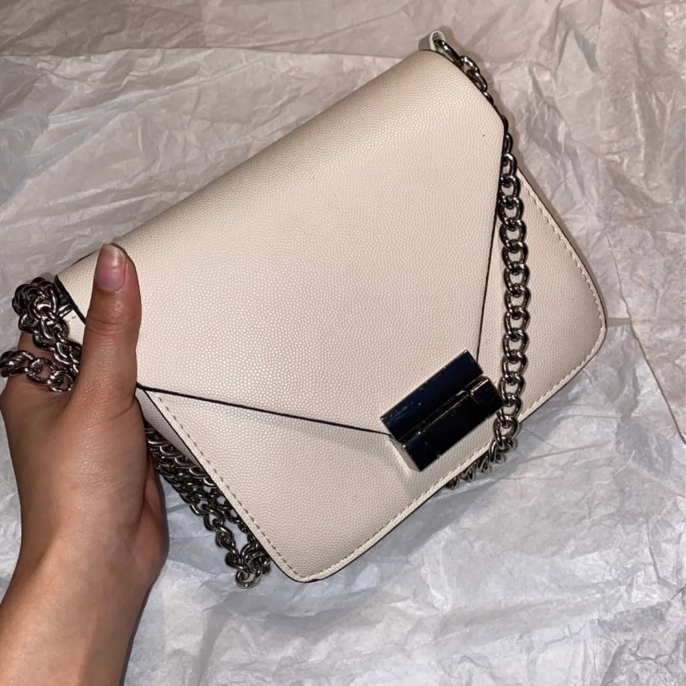 Beige envelope crossbody bag